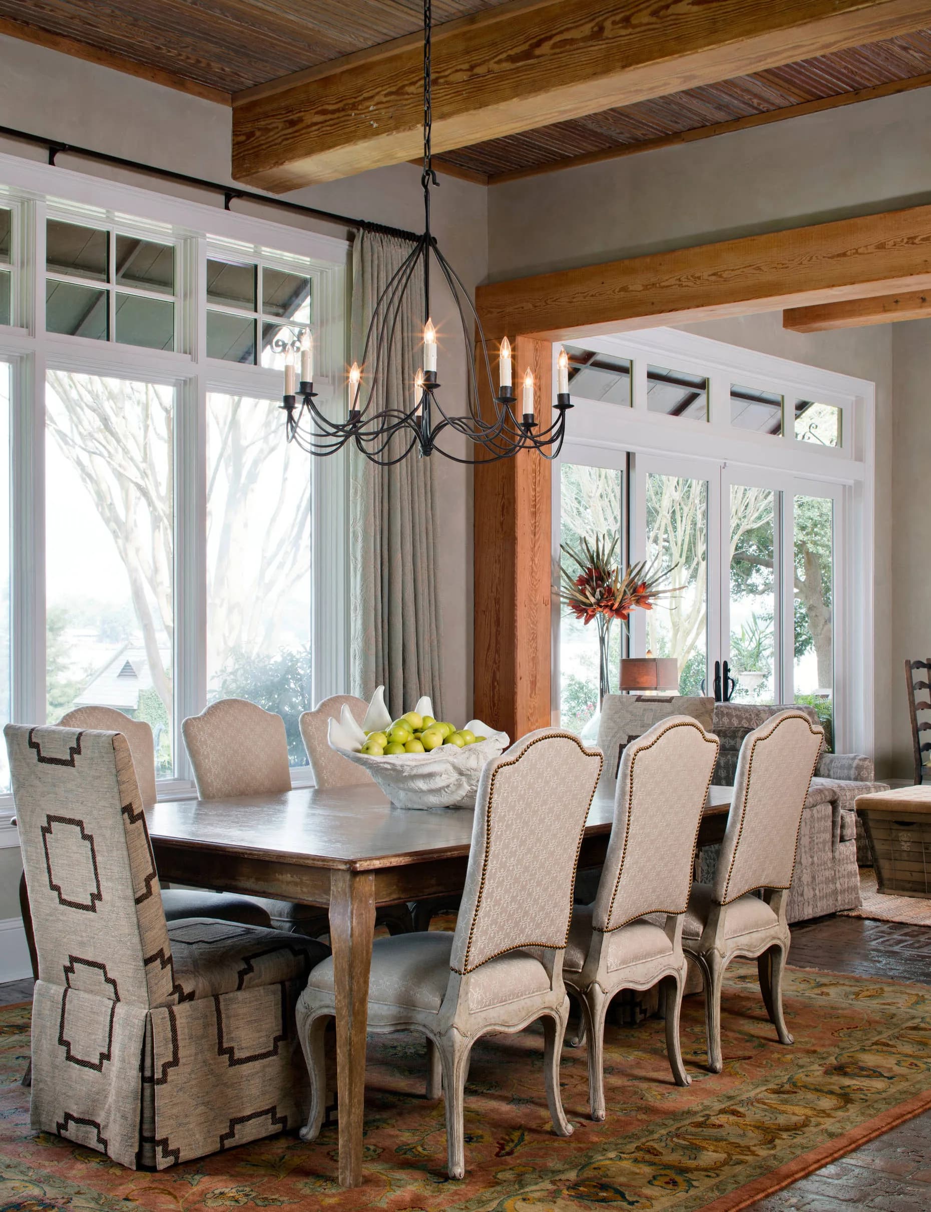 A dining room with a timber ceiling