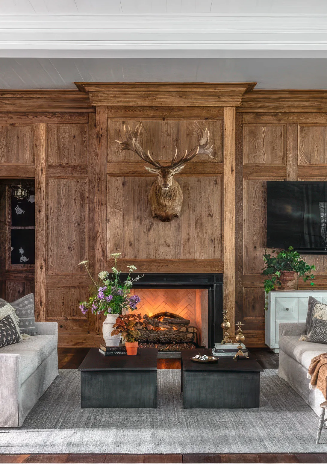 Reclaimed oak millwork around a fireplace