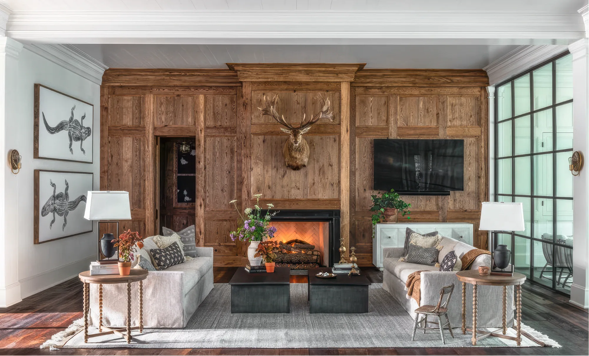 Full view of oak wall paneling and a fireplace in a furnished living room