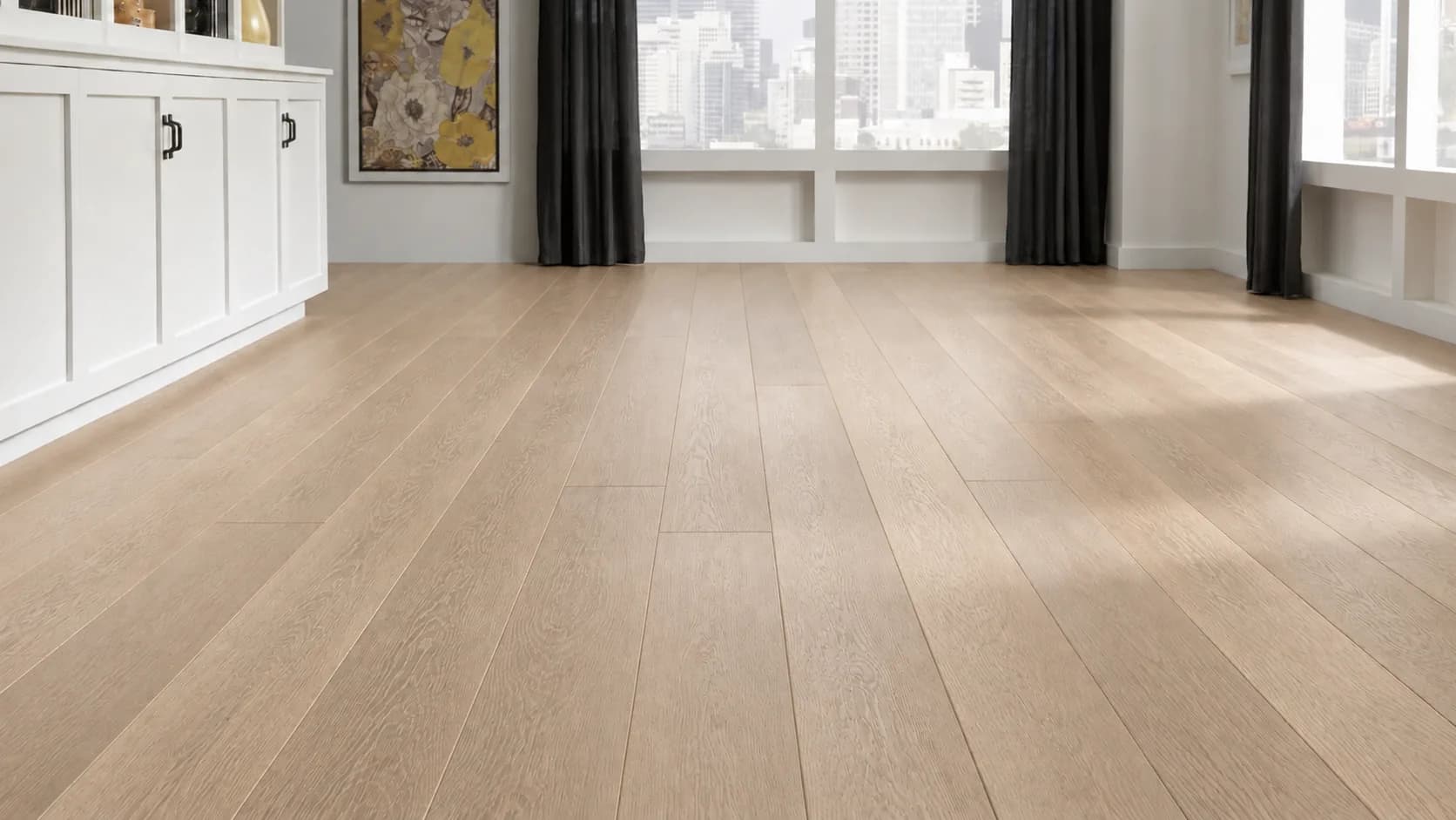 Wide plank pale oak flooring running to the windows