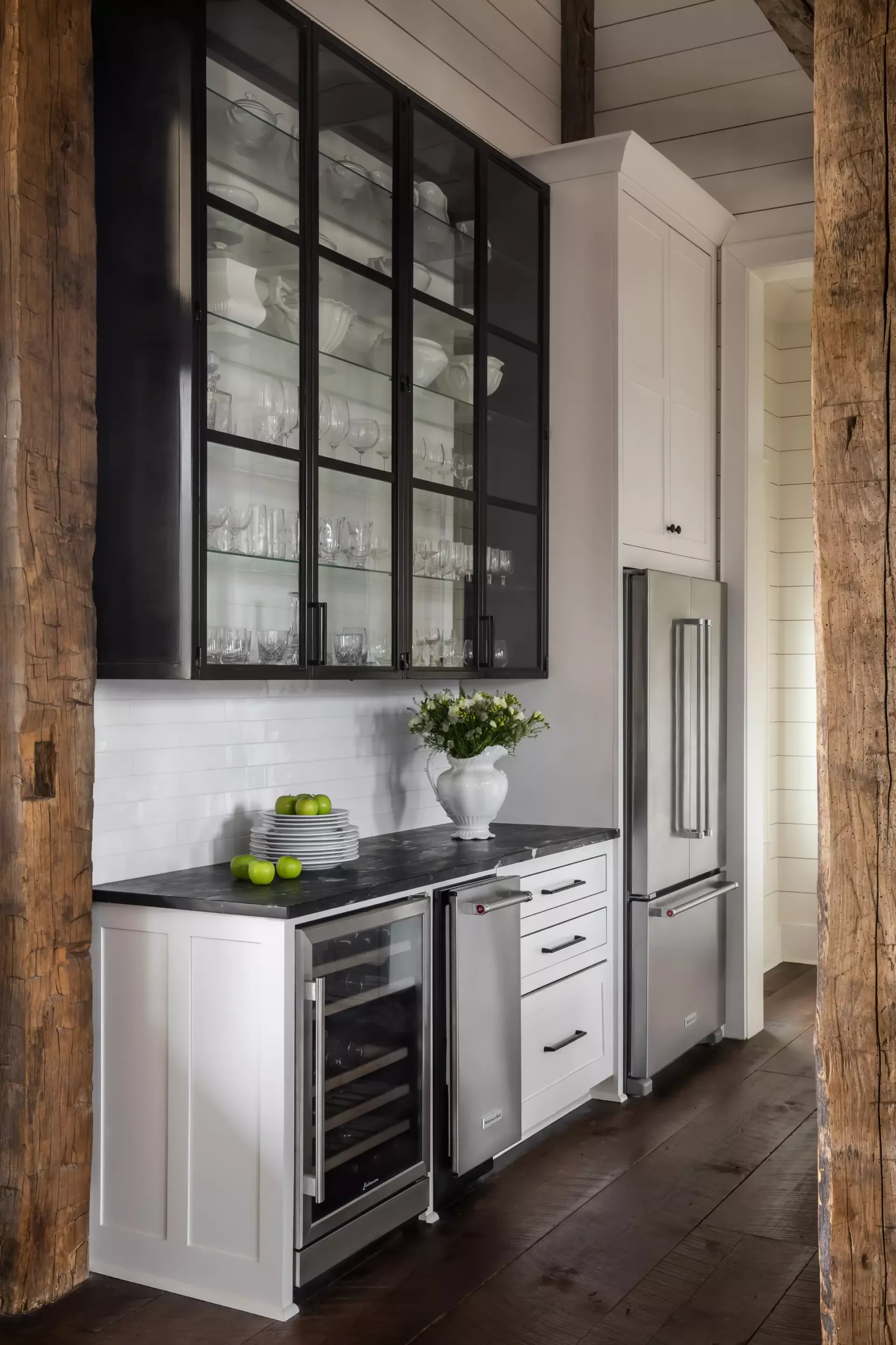 A pantry lined with reclaimed timber