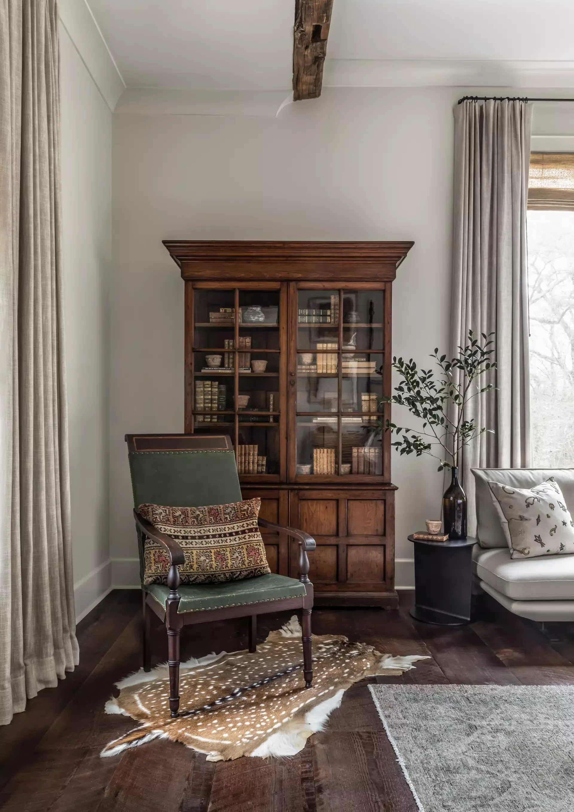 A living room framed in reclaimed timber