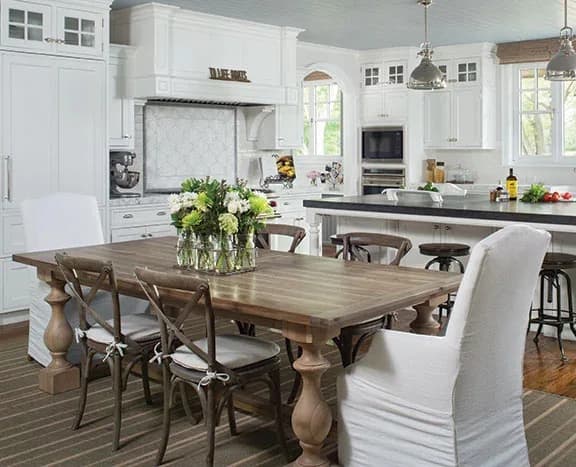 A dining room beside the kitchen