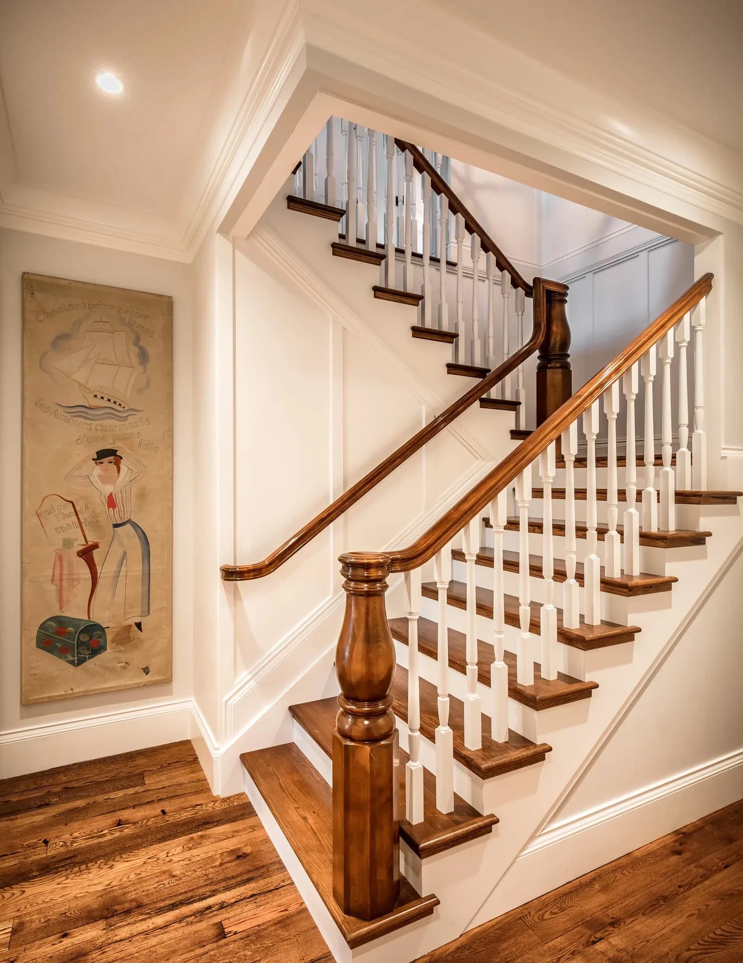 A stair hall with turned newels